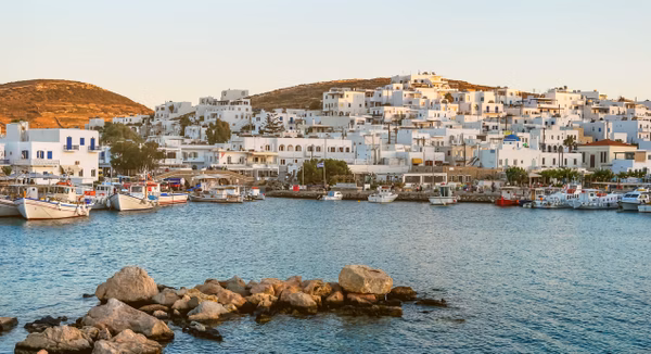 Old port in paros at sunset