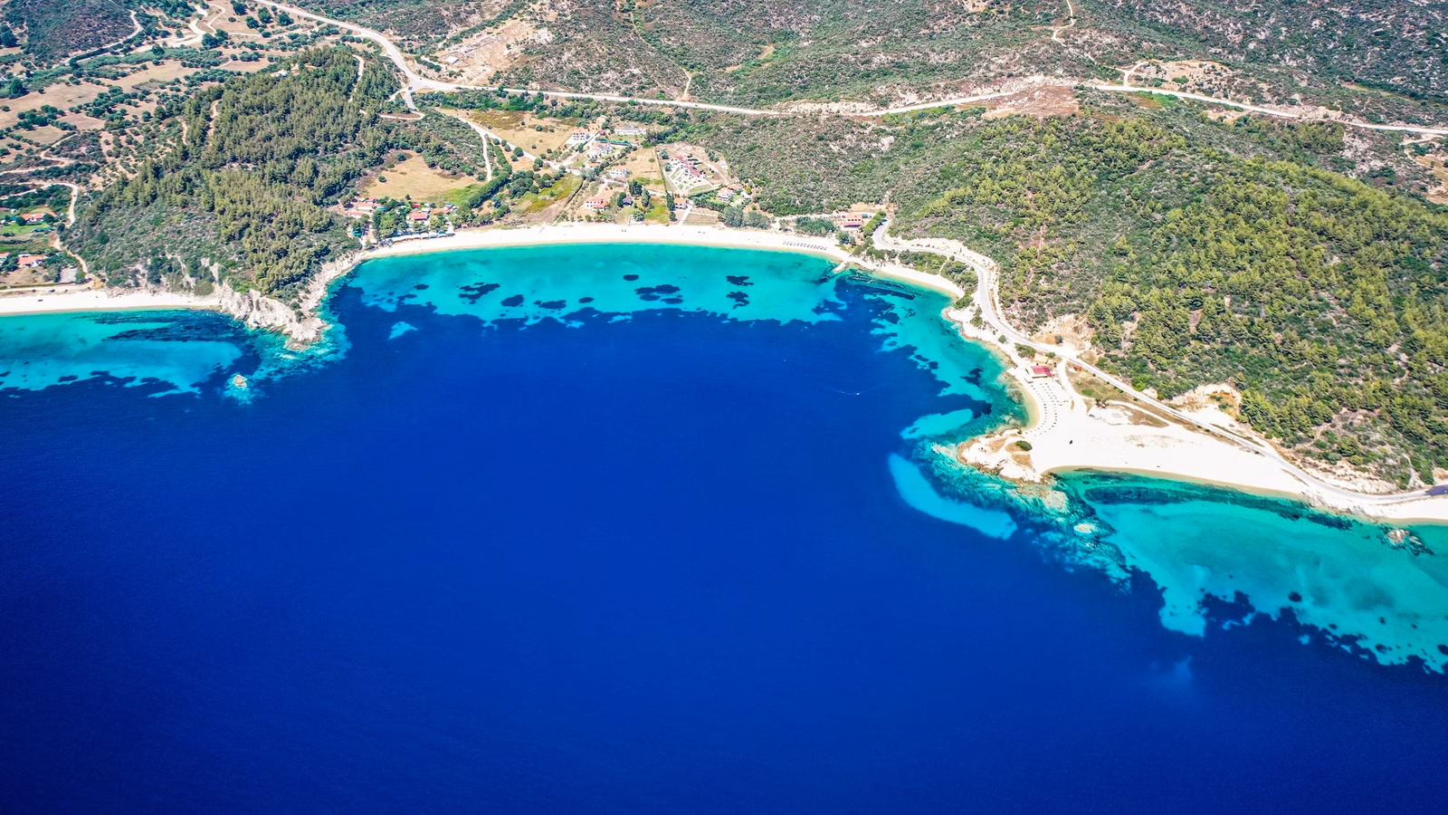 Aerial view of the blue sea and the shore